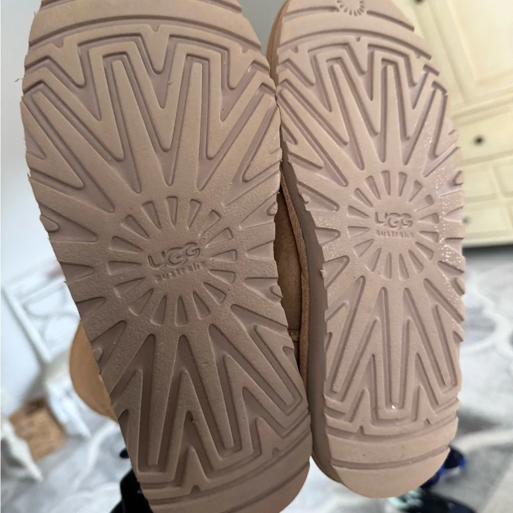 UGG Kids Tan Shearling Boots with Navy Bow Accents